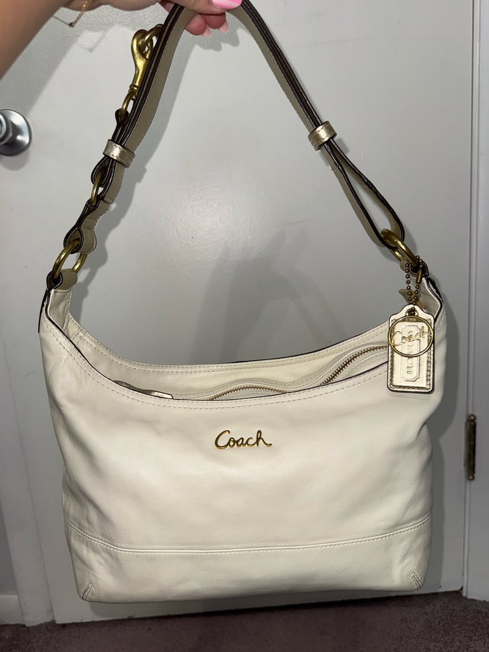 Coach white leather hobo shoulder bag in off white with gold hardware